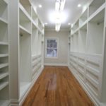 white built-in master closet