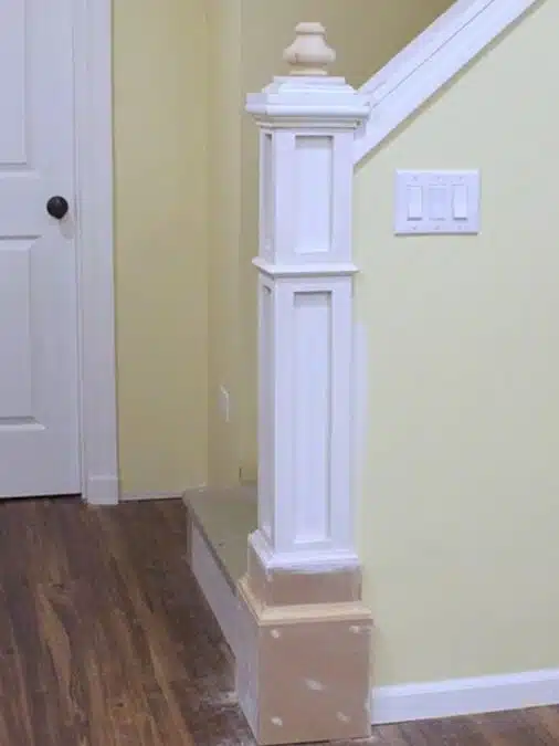 How to Build a Newel Post: DIY Stair Detail 4 Nearly complete newel post with first finial installed and unfinished stacked base detail