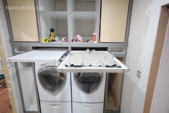 DIY pull-out sweater drying rack.