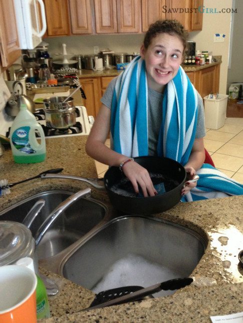 madison cleaning the kitchen