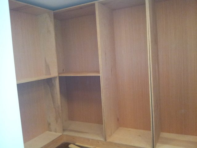 Building cabinets in walk in closet