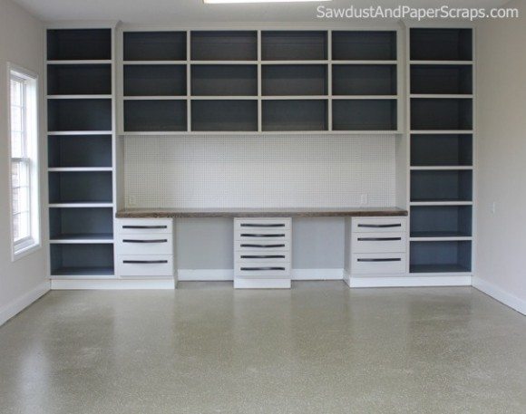 Garage-Workshop-with-Wood-Countertop-and-Painted-Cabinets-580x457