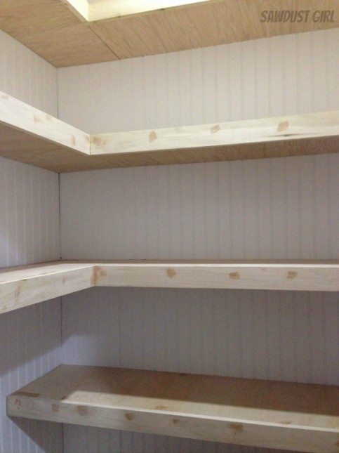 Hall closet with floating shelves