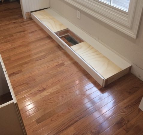 A Cabinet Base With Floor Vent, Installing Kitchen Cabinets Over Baseboard Heaters