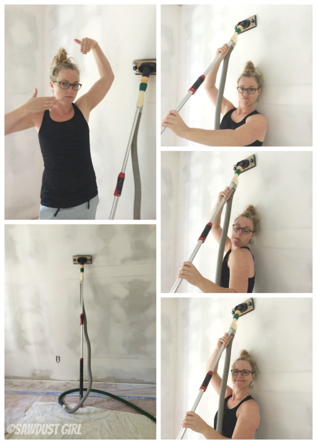 Sanding drywall after skim coating with a sander that attaches to shop vac.