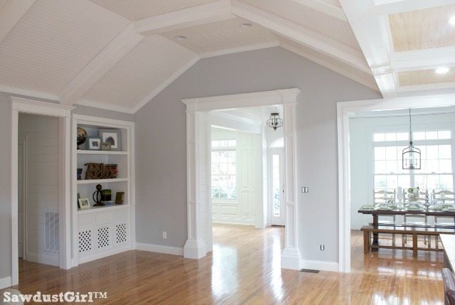 Living room with box-beam ceiling.