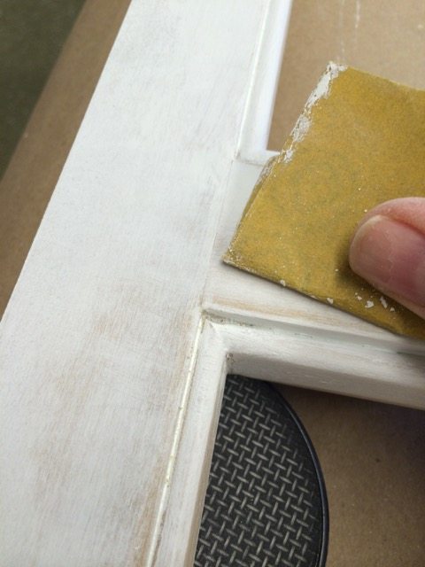 6 prime and paint - fold a piece of sand paper to get into the bead and clean it up