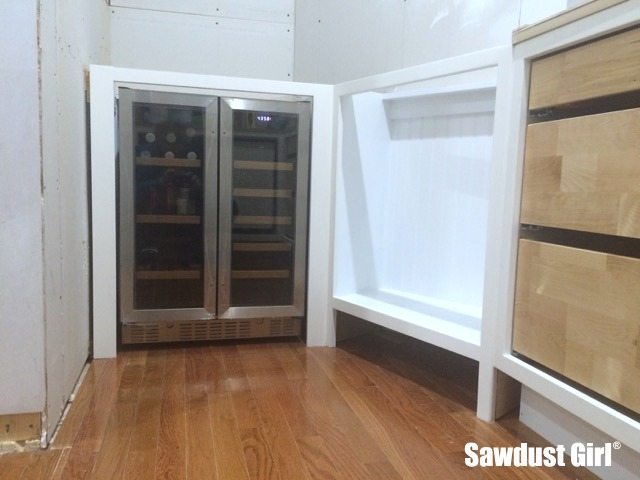 Here's a DIY beverage station made just from a couple of inexpensive  cabinets and a beverage cooler.