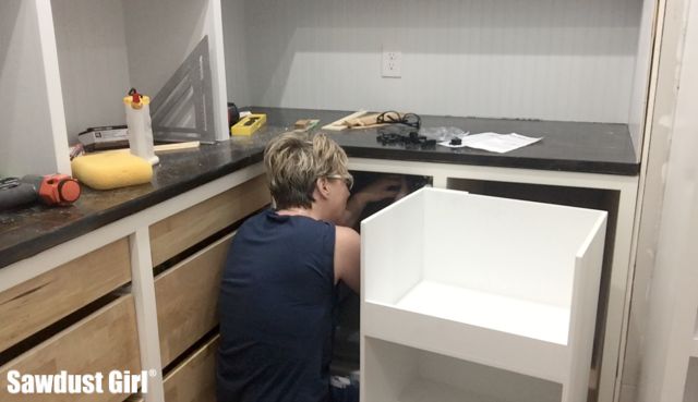 https://sawdustgirl.com/wp-content/uploads/2015/08/removing-blind-corner-cabinet.jpg