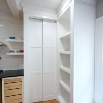 Hidden Entrance to Pantry with Pocket Doors