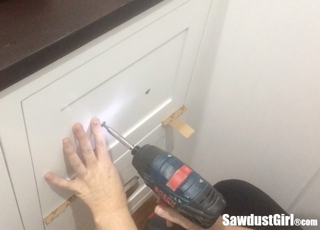 Use washer head screws to install drawer fronts on a cabinet drawer box