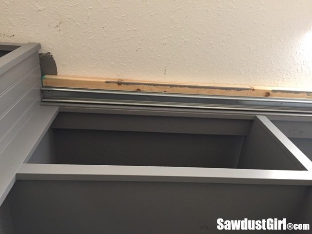 An Easy Guide to Building DIY Sliding Doors for Cabinets - track for sliding cabinet doors