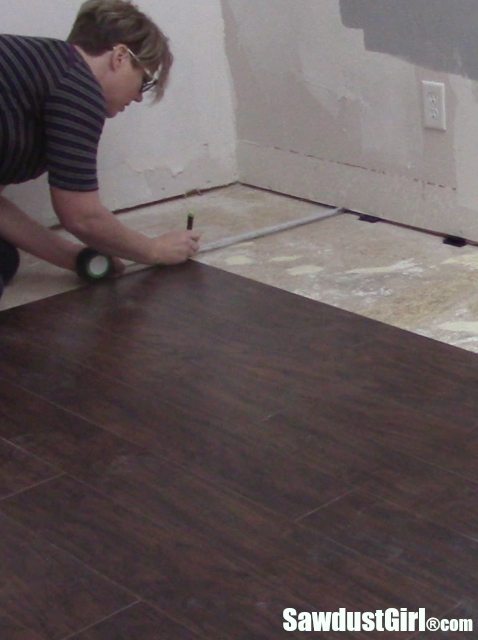 Pergo Installation Laminate Flooring, Do You Install Flooring Under Cabinets