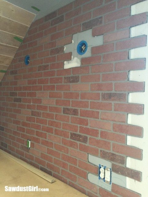 Faux brick and plaster wall