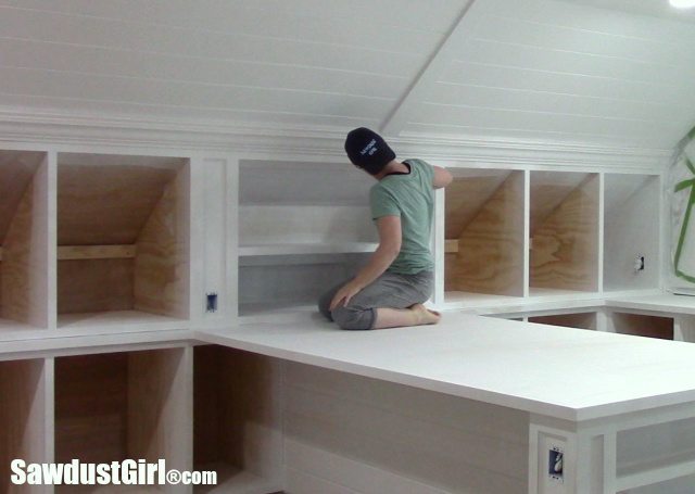 Sanding Countertops and Cabinets after priming.