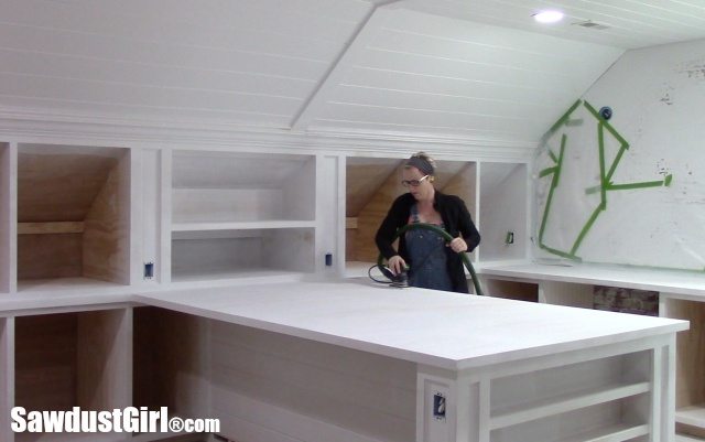 Sanding Countertops and Cabinets after priming.