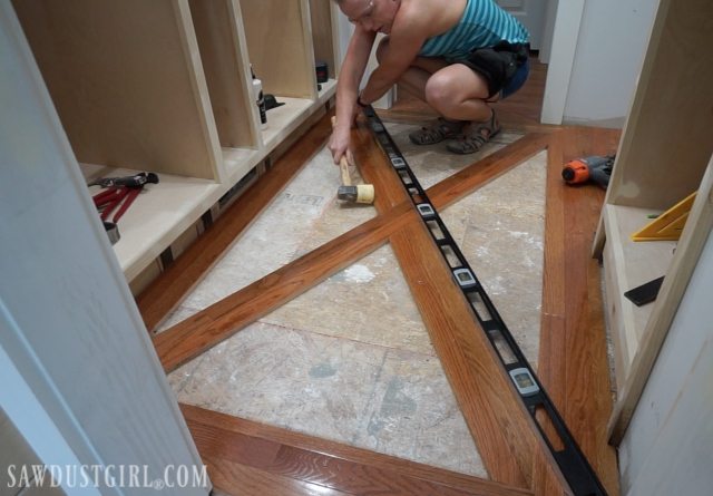 Wood floor with brick tile inlay