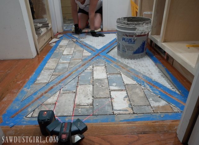 Wood floor with brick tile inlay