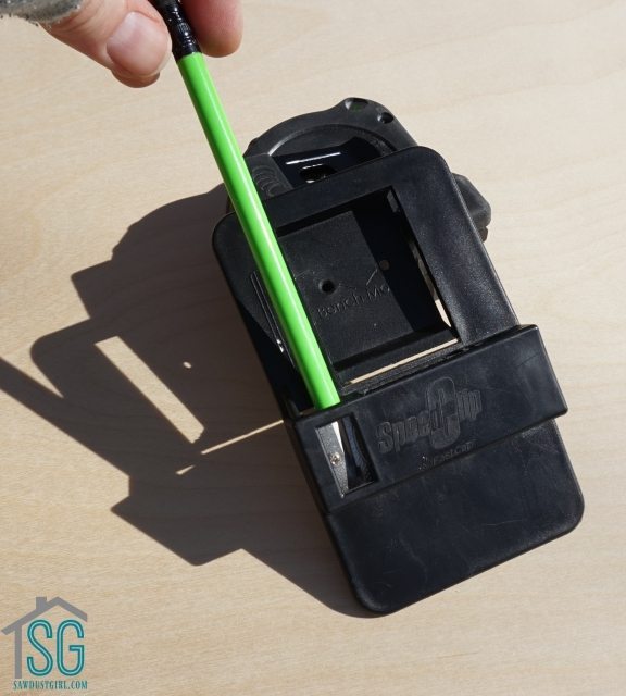 Tape Measure Holder with built-in pencil sharpener