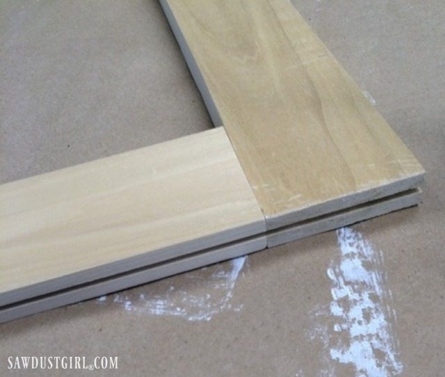 Groove cut into bottom of door to slide on steel bar