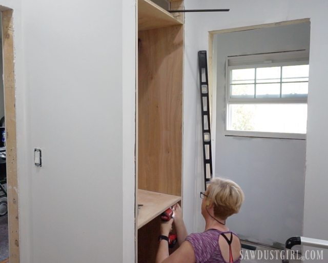 Built in discount hallway linen cabinets