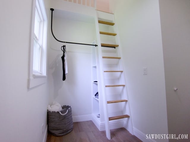 bedroom loft with open closet design