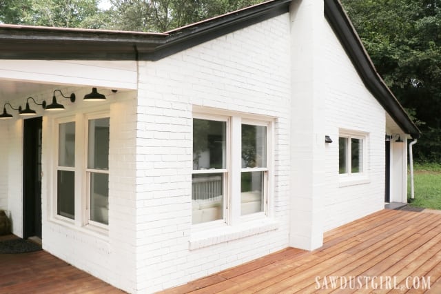 white brick home with black accents