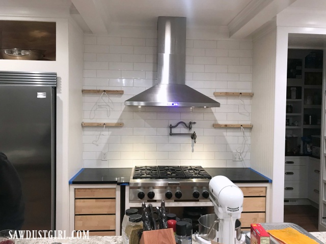 Installing floating shelves in kitchen