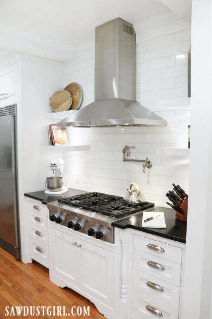 Kitchen reveal with cooktop cabinet decorative legs