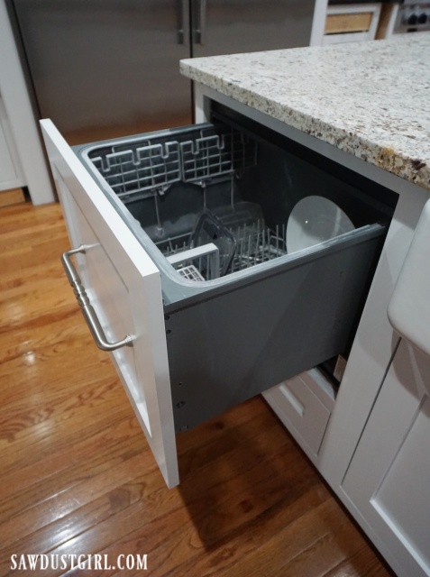 Built-in dishwasher drawer. Looks like a cabinet drawer!