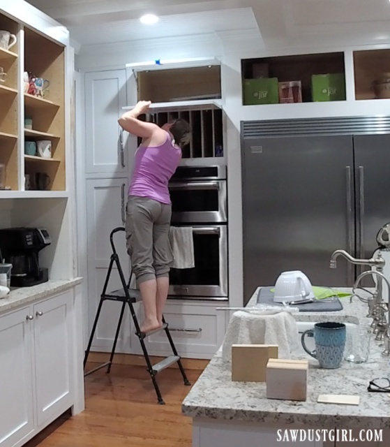 Installing lift open cabinet doors