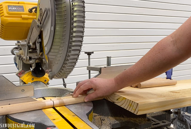 How to Build a Bench with a Built-in Boot Rack - Stop block for miter saw for consistent length cuts.