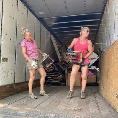 a truck full of old farm lumber and tools