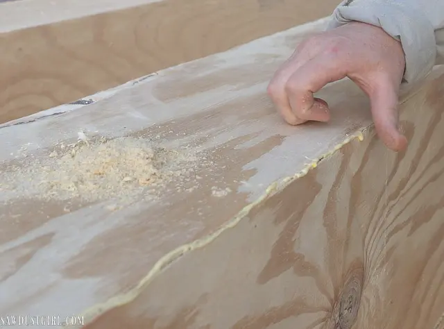 filling cracks with glue and sawdust
