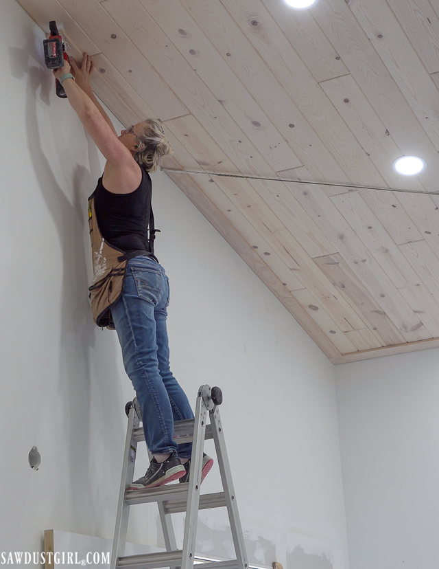 How to Whitewash a Knotty Pine Wood Ceiling for a Scandinavian Look