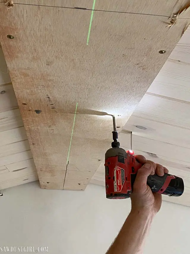 securing nailer plate for wood beam